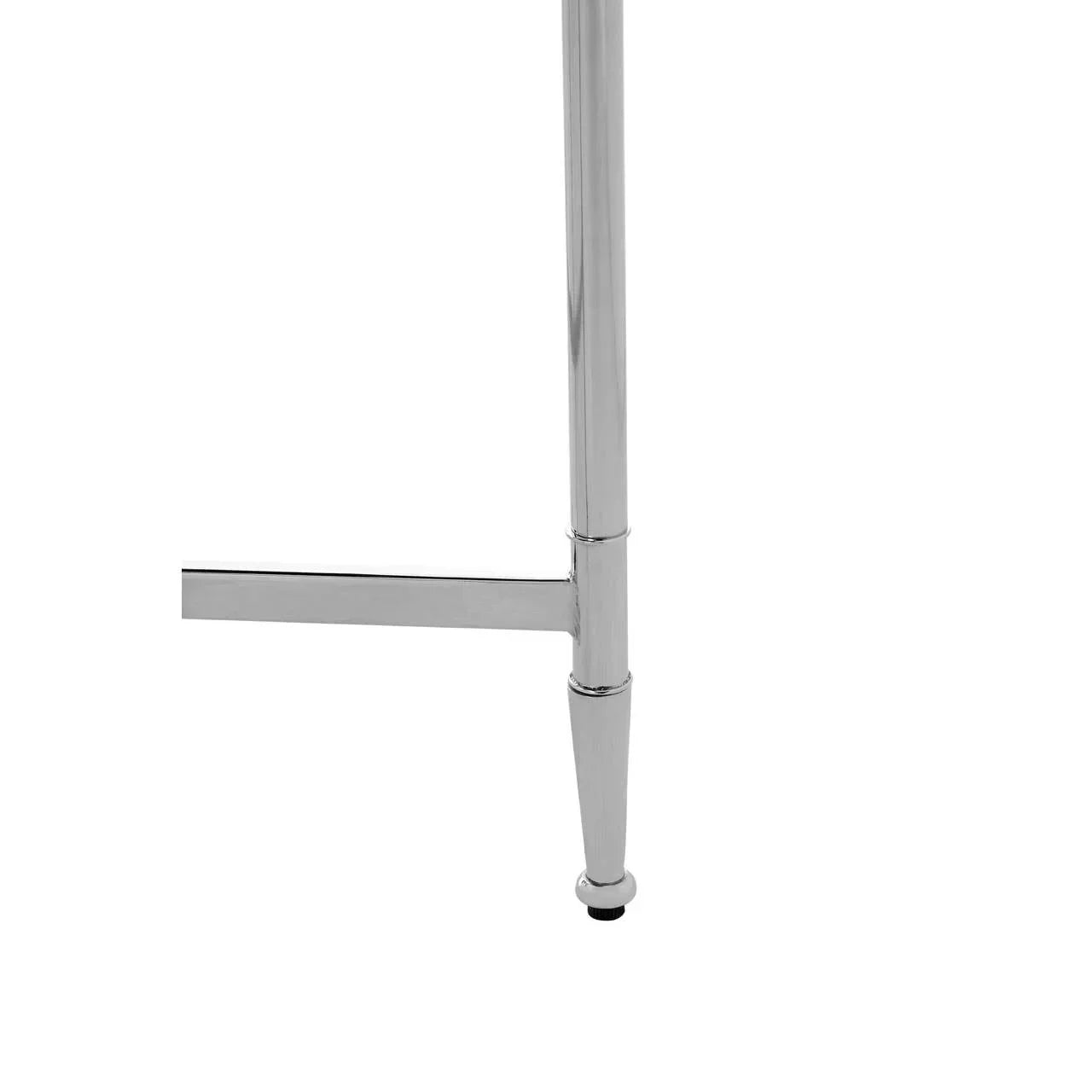 Close up of chrome furniture leg with crossbar, metallic finish