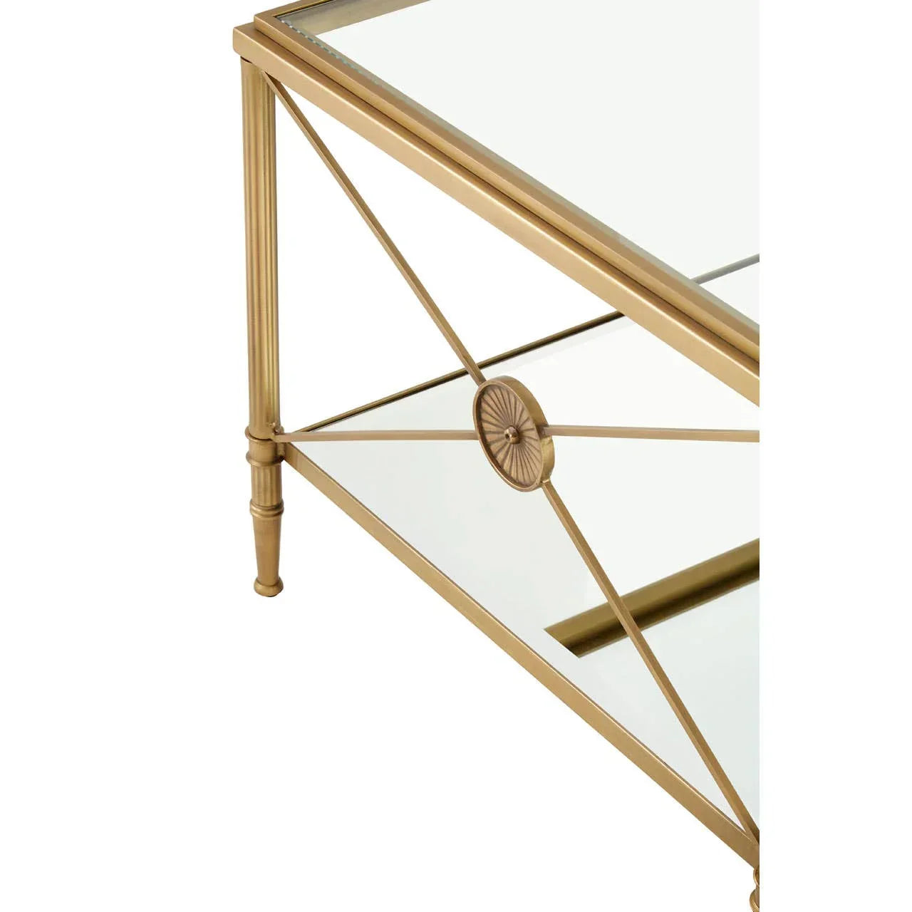 Gold metal and glass coffee table corner with decorative detailing and lower shelf