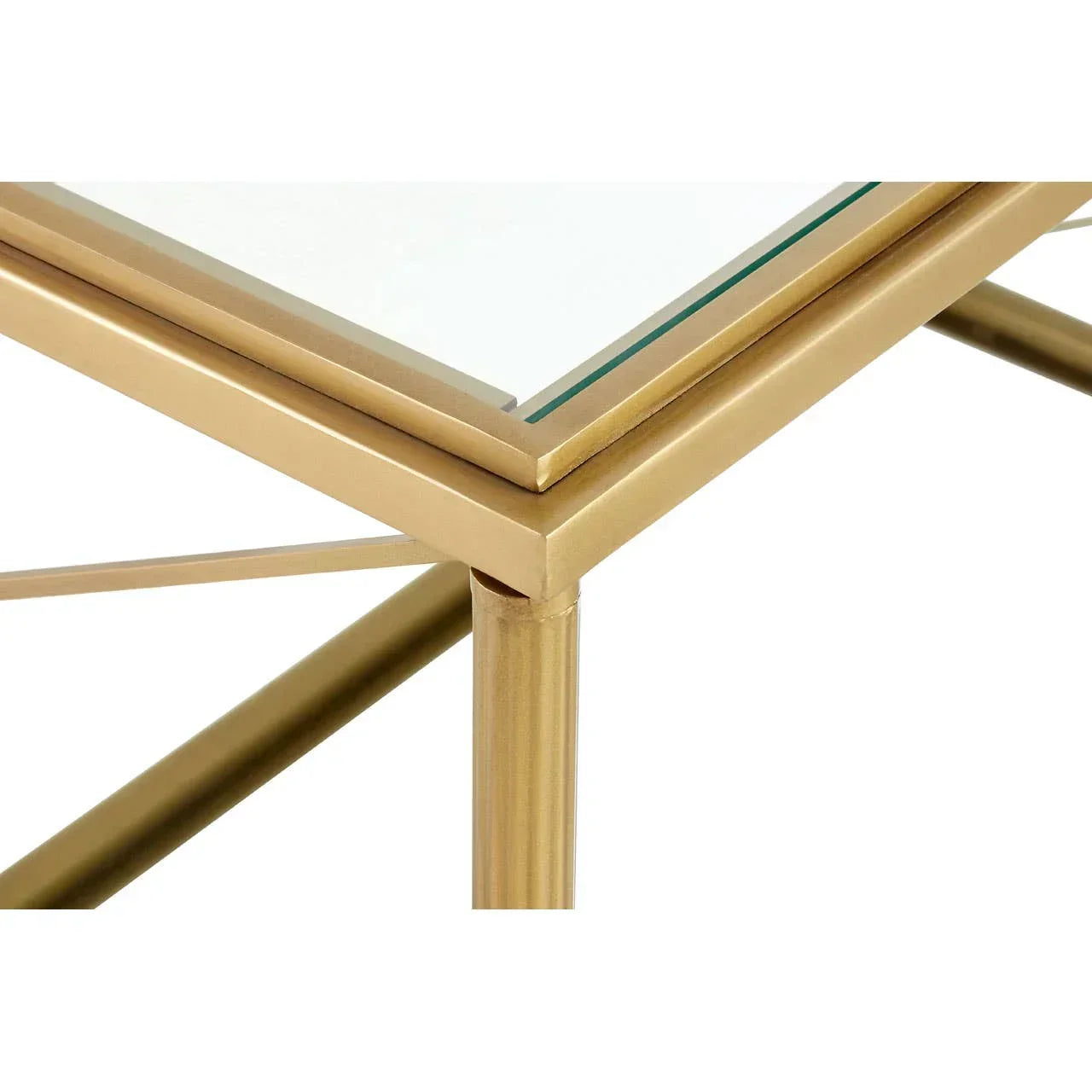 Glass top table with gold metal frame corner detail