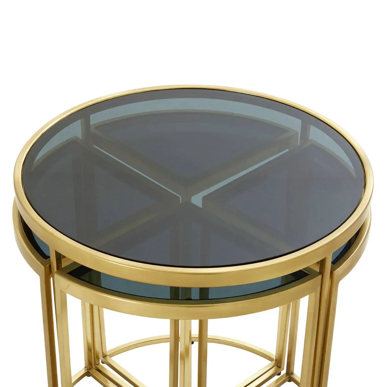 Round gold side table with smoked glass top and geometric metal frame