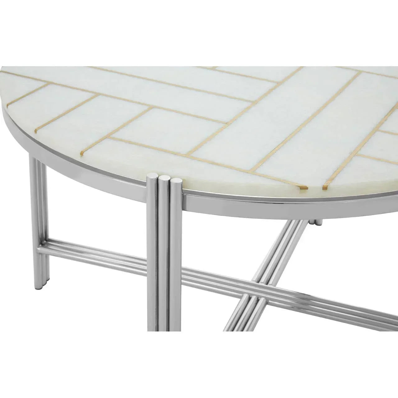 Round coffee table with white patterned top and chrome metal frame, close-up view