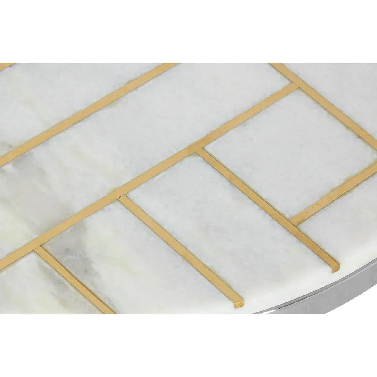 Marble table top with gold metal inlay detail, geometric pattern close-up