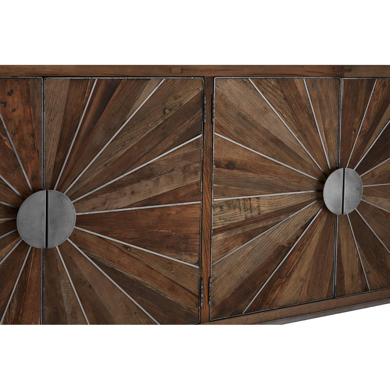 Wood sideboard cabinet with sunburst pattern and metal handles, close-up view of doors
