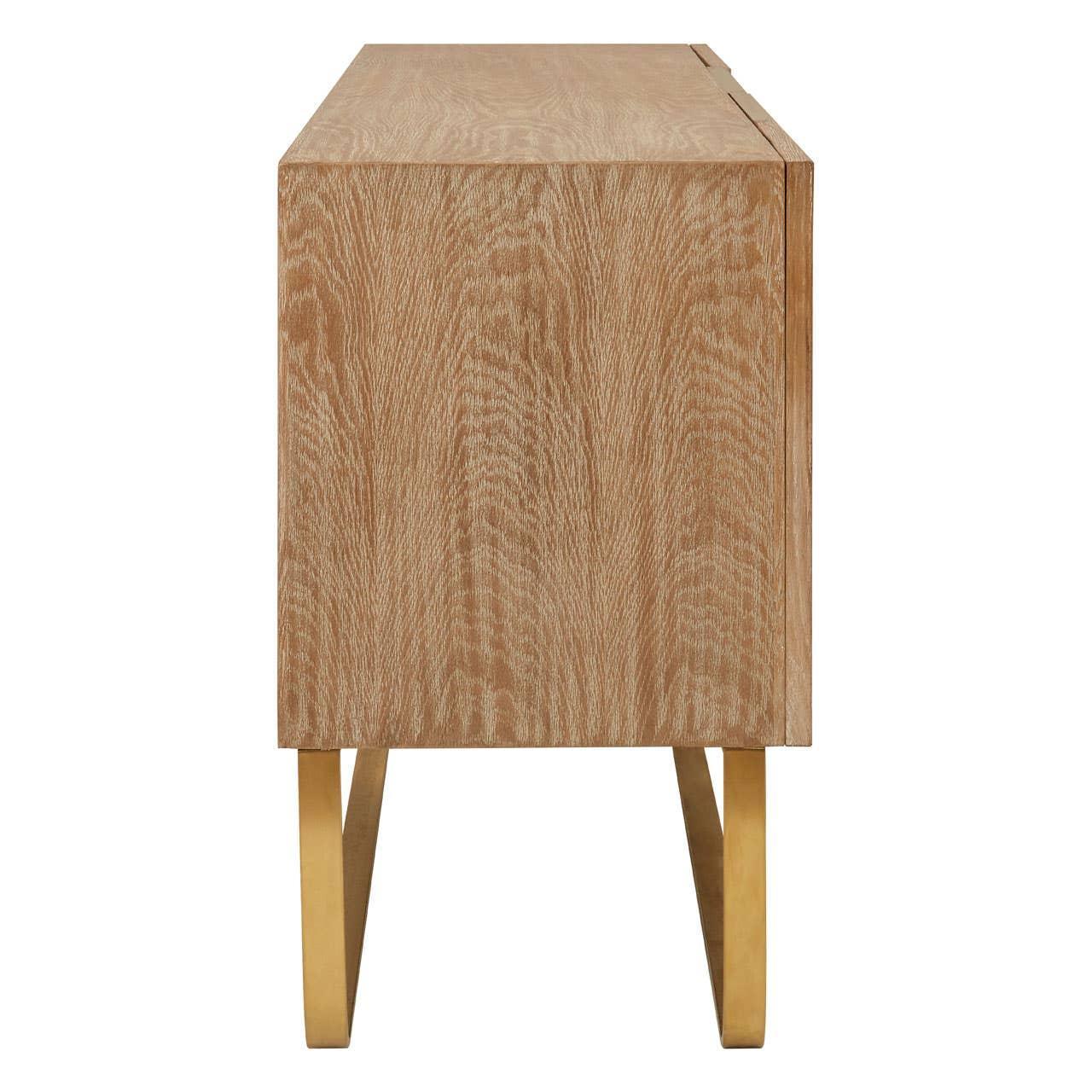 Side view of wooden sideboard with oak finish and gold metal legs