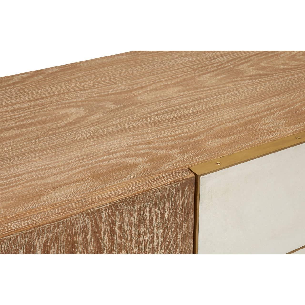 Oak wood sideboard corner with brass trim and white front detail