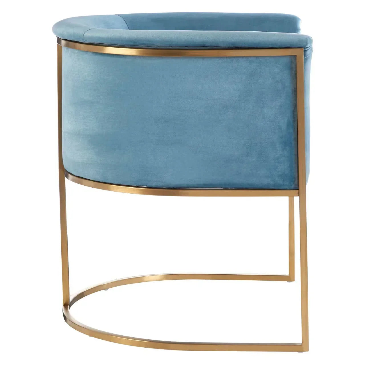 Blue velvet accent chair with curved back and gold metal frame side view