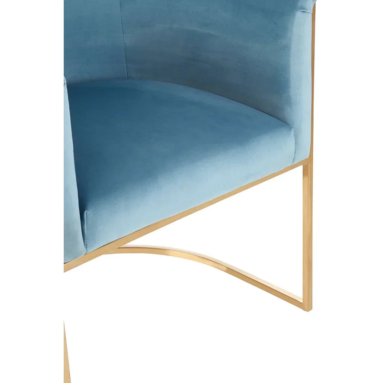 Blue velvet accent chair with gold metal frame closeup