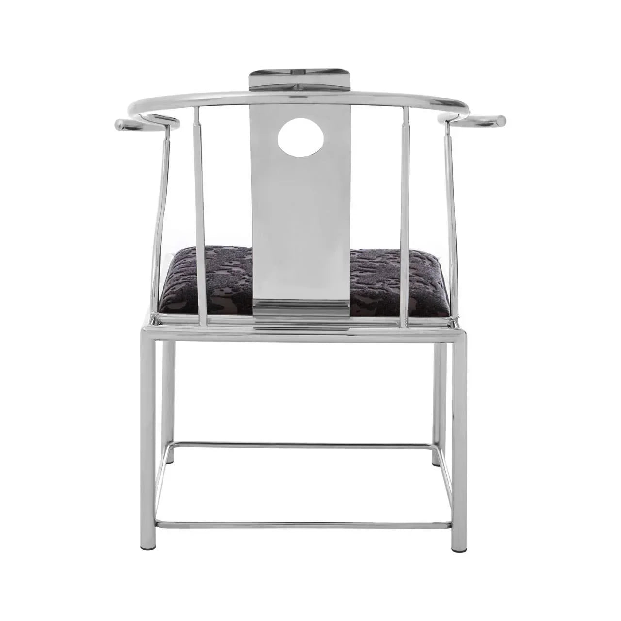 Modern chrome dining chair with curved metal frame and black cushioned seat, rear view