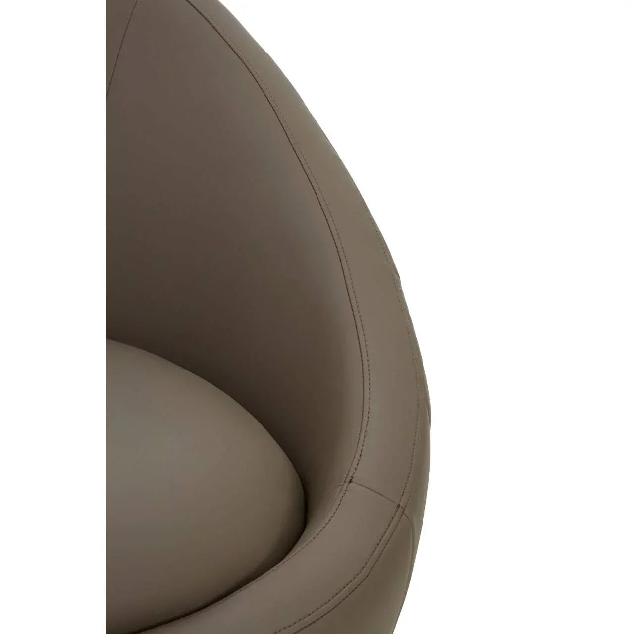 Close-up of brown leather chair with curved backrest and seat cushion detail