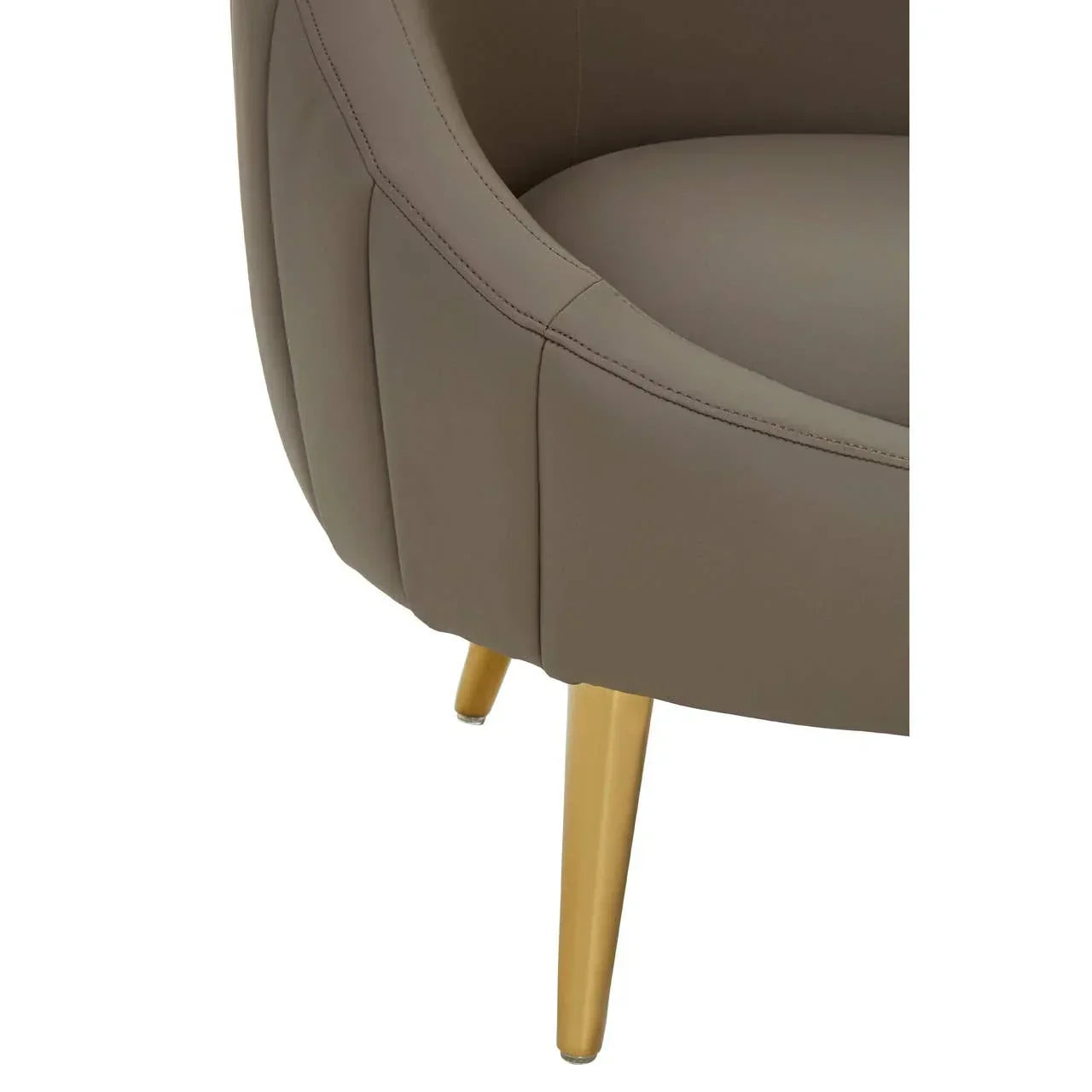 Close-up taupe accent chair upholstery with gold metal legs and stitched detailing