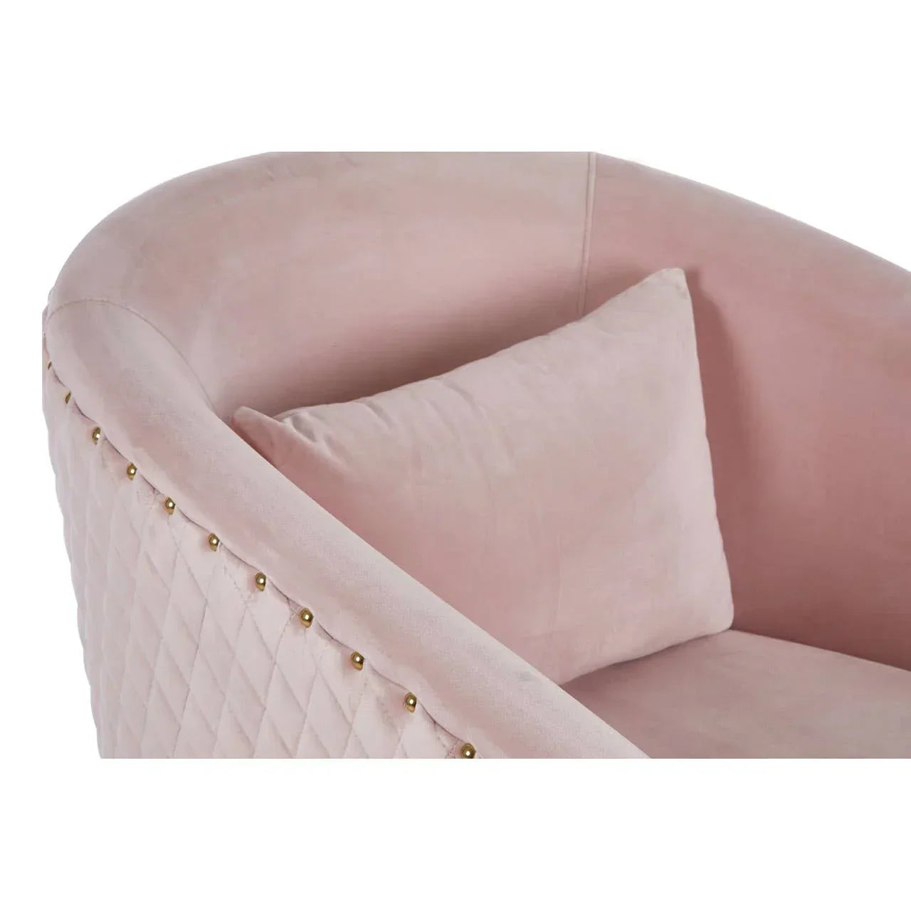 Pink velvet armchair with quilted backrest and gold stud detailing