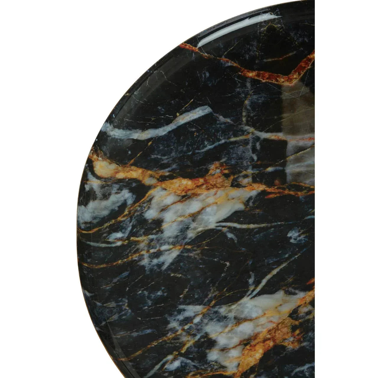 Closeup of black marble tabletop with gold and white veining
