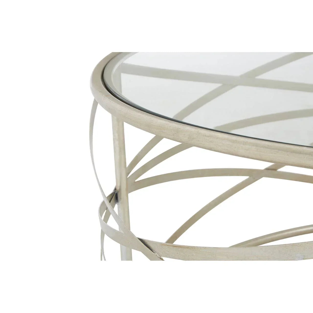 Round glass coffee table with silver metal frame and curved geometric legs, closeup view