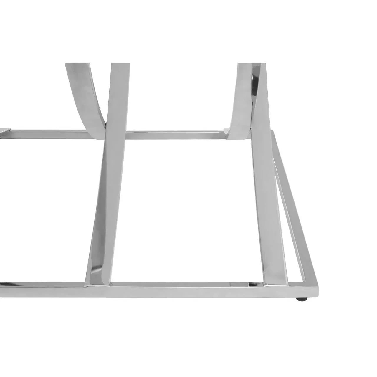 Stainless steel dining table base with modern angled legs and polished metal finish