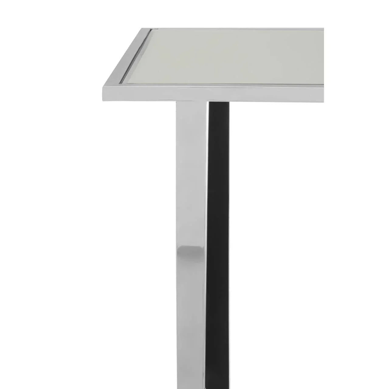 Chrome metal table leg with glass tabletop, side angle view