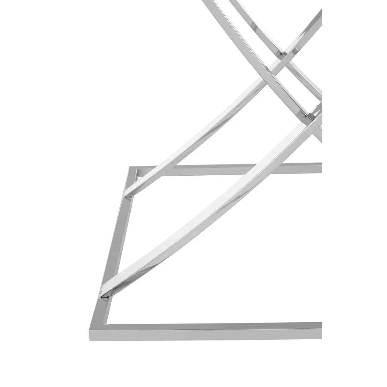 Close view of chrome metal table base with intersecting legs and geometric frame