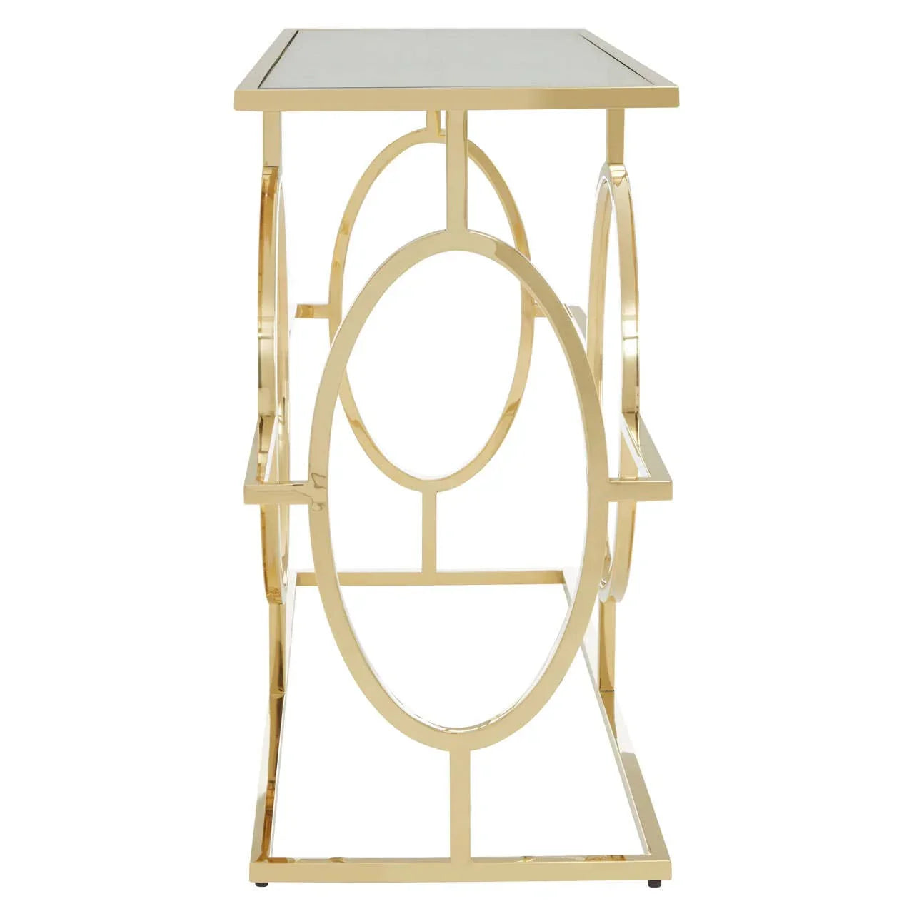 Gold metal side table with geometric oval frame and glass top, shown from side angle