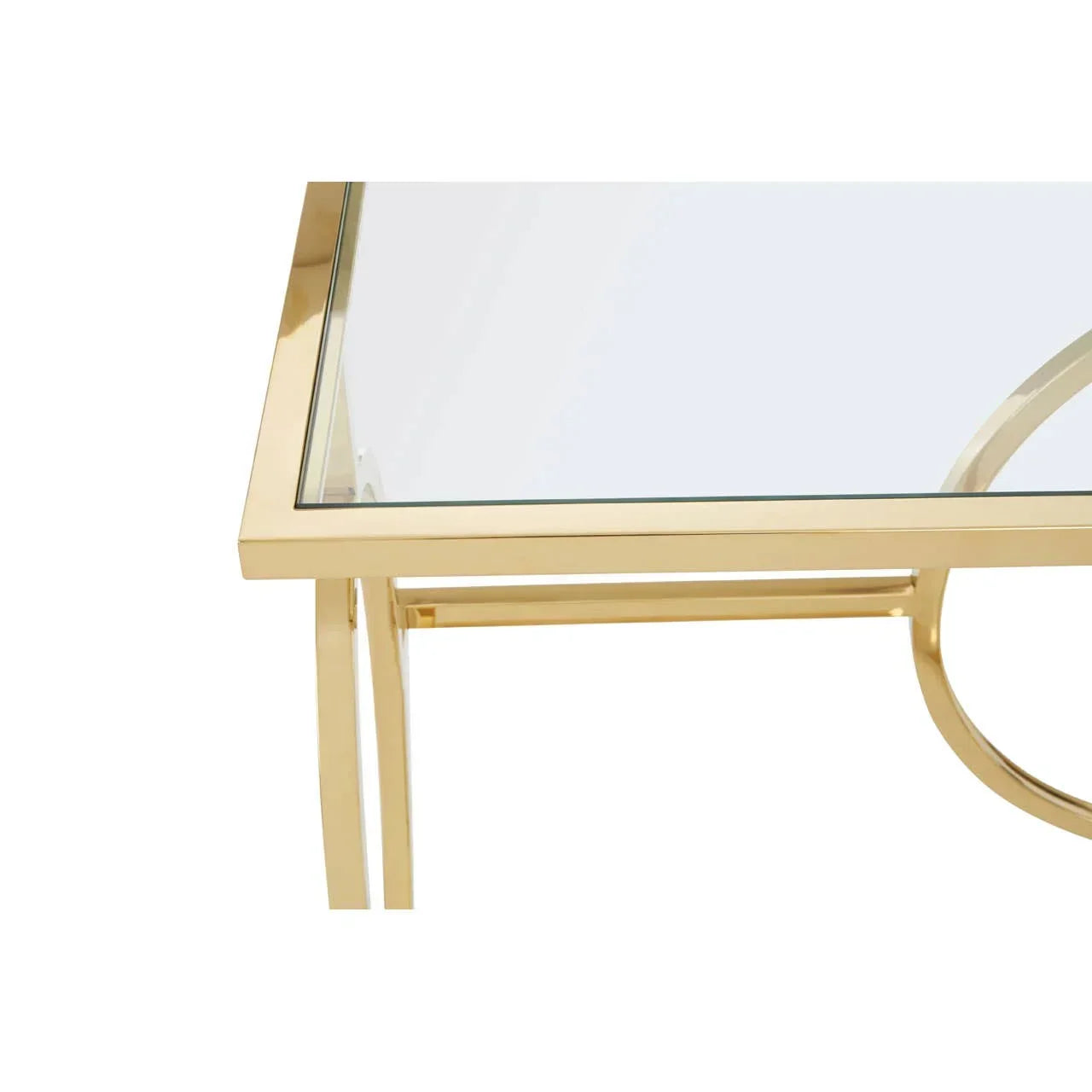 Glass coffee table with gold metal frame, close-up of corner and leg detail