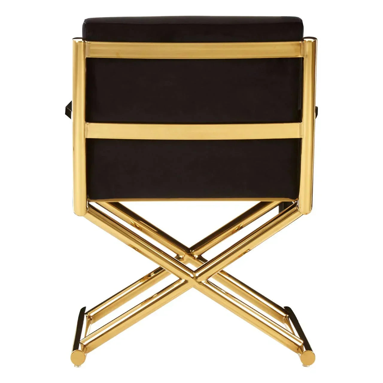 Rear view of black velvet dining chair with gold metal frame and crossed base