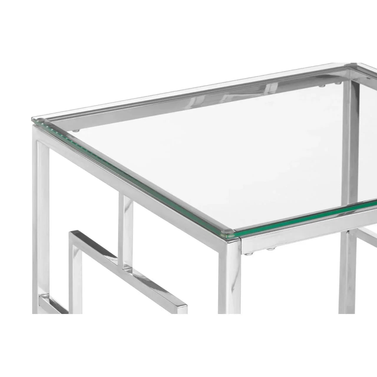 Modern glass side table with chrome metal frame and geometric pattern detail