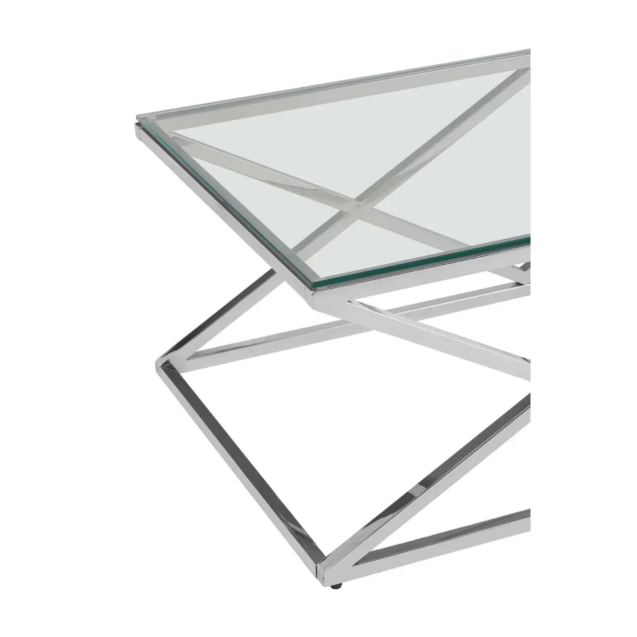 Glass coffee table with chrome metal frame and geometric base, close-up corner view