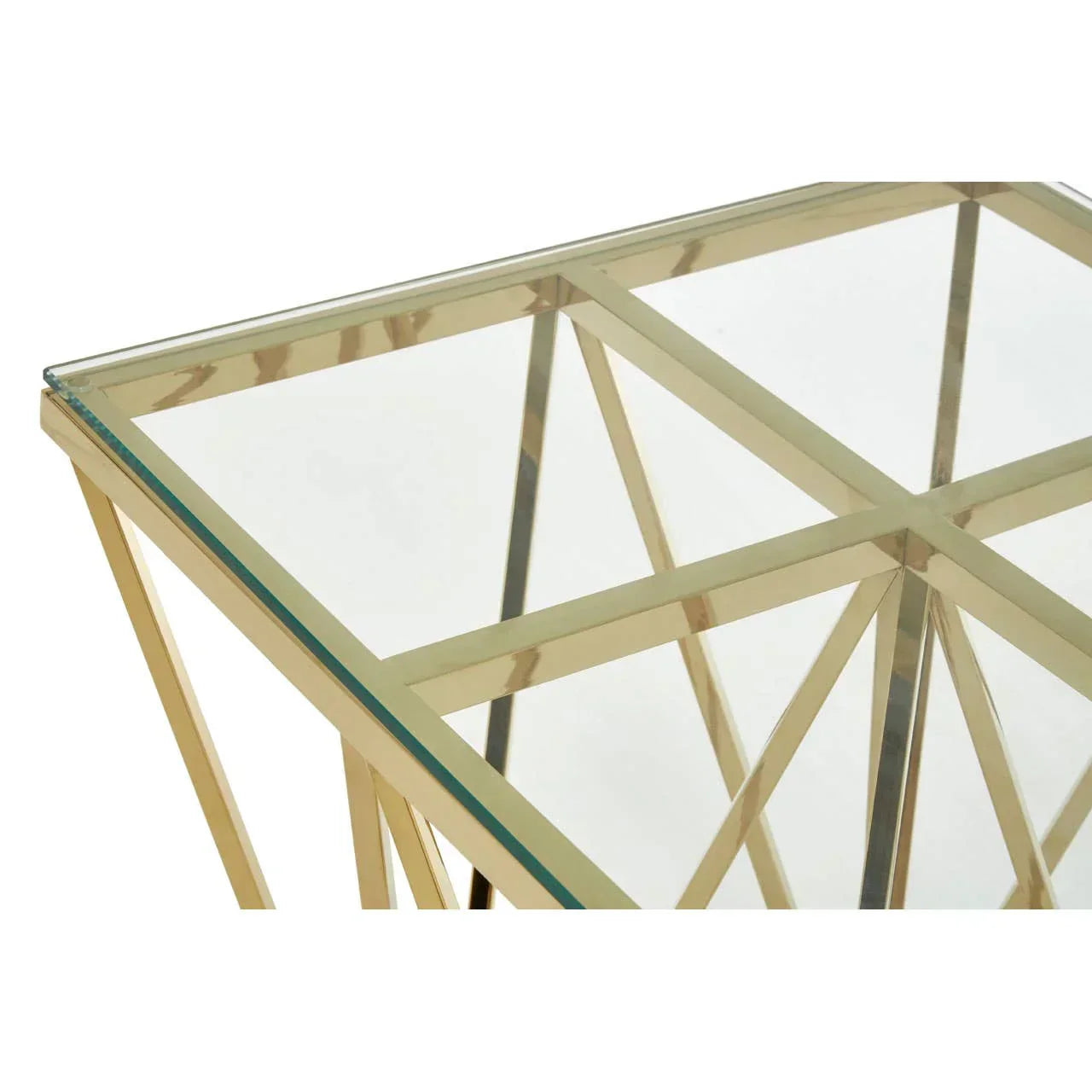 Glass top side table with gold metal geometric frame, close corner view