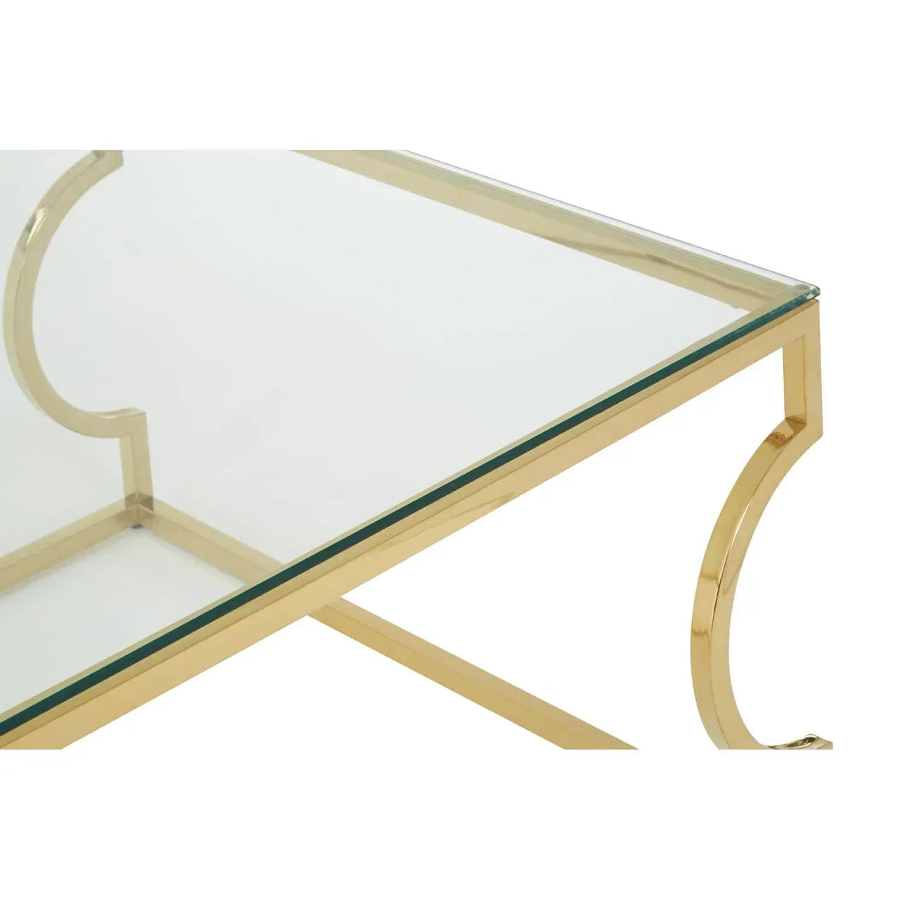 Glass coffee table with gold metal frame and curved leg detail, corner angle view