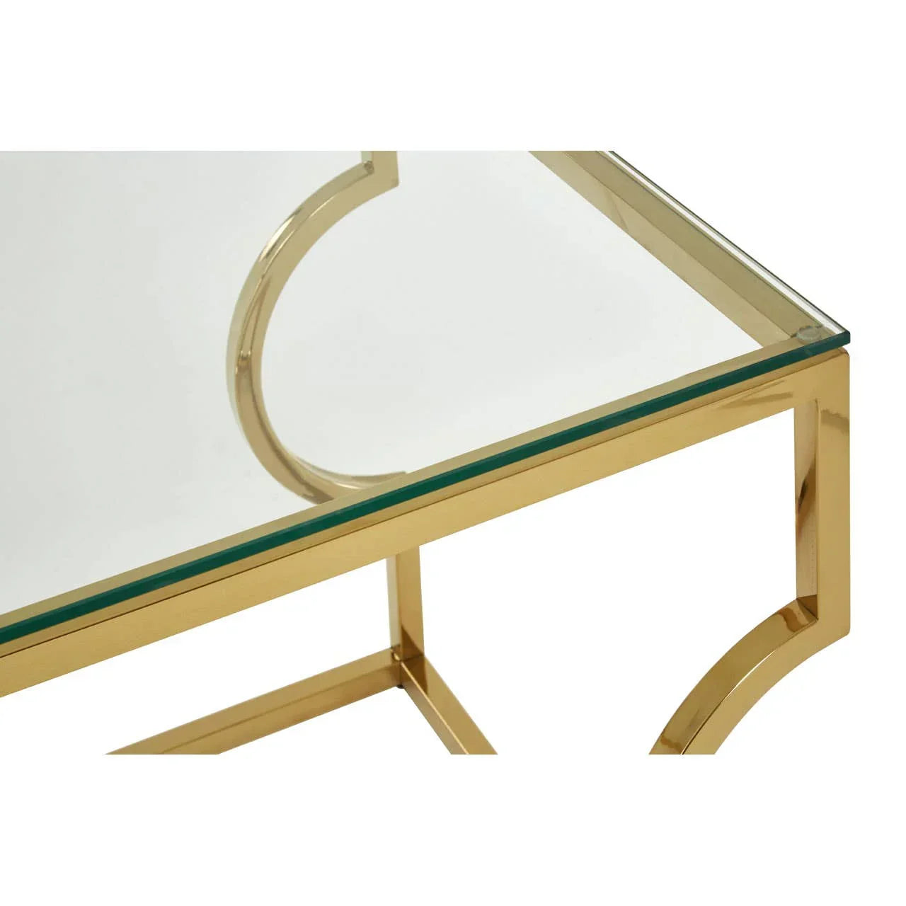 Glass coffee table with gold metal frame, corner detail and contemporary design
