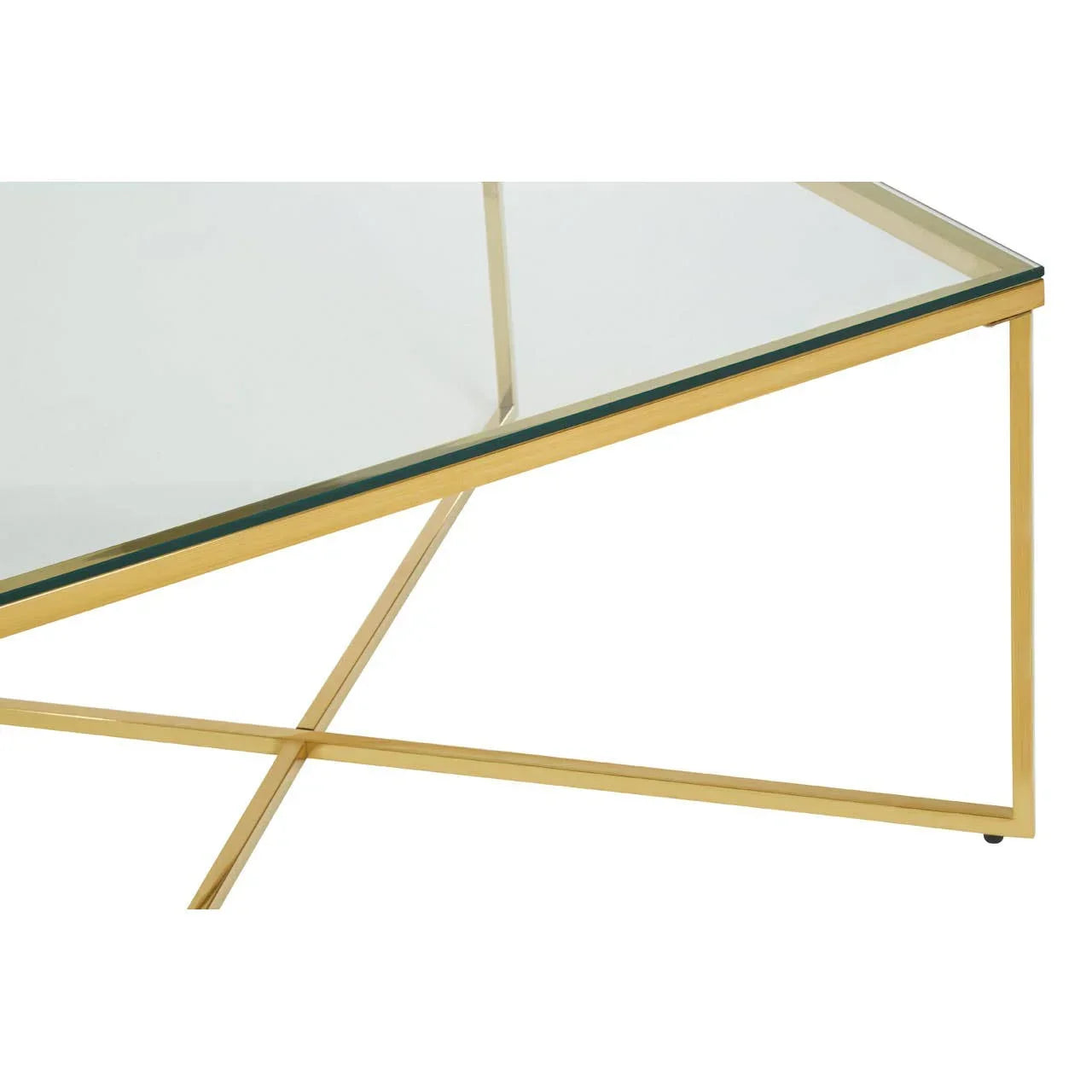 Glass coffee table with gold metal frame and angled cross legs, corner detail view