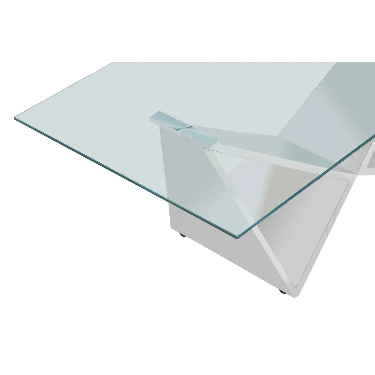 Clear glass dining table with geometric white metal base, close-up angle