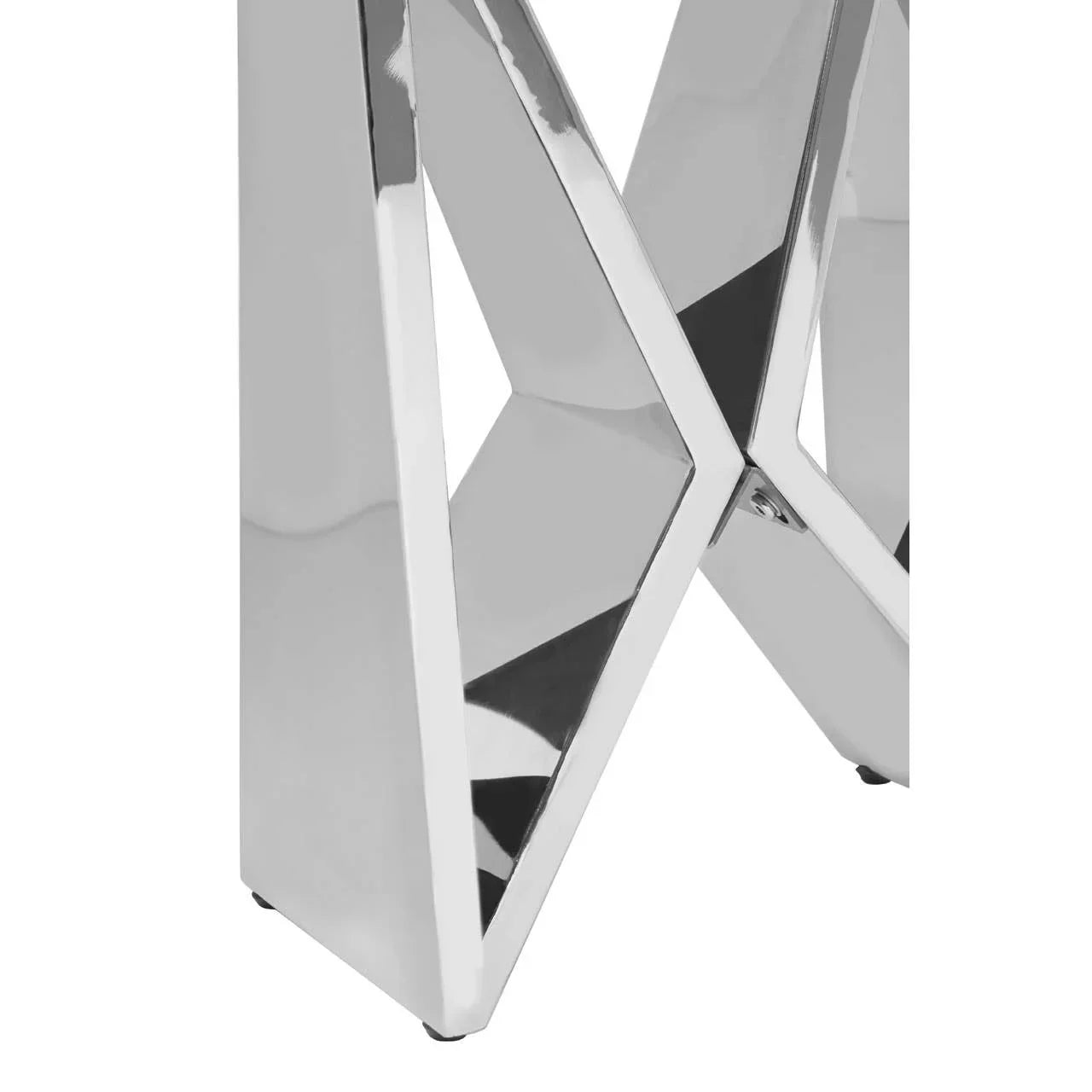 Close up of chrome metal dining table leg with angular geometric design