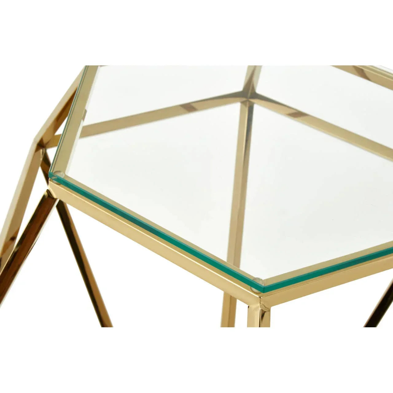 Glass top side table with gold metal geometric frame, corner detail view