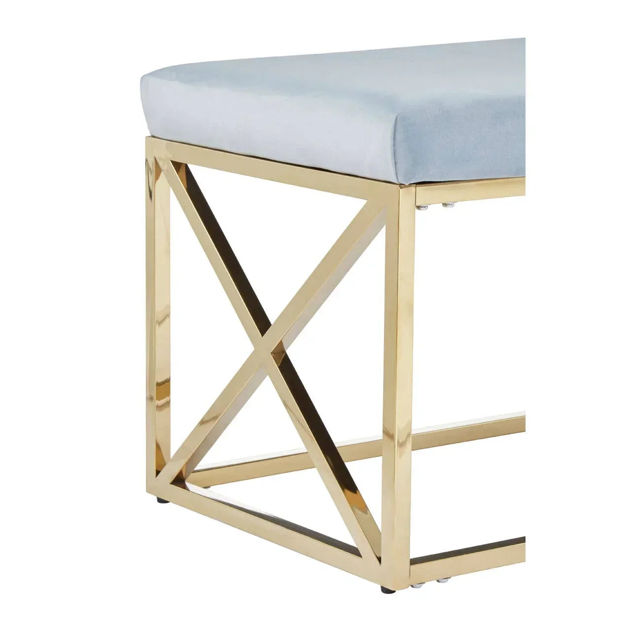 Gold metal bench frame with pale blue upholstered cushion, modern geometric design