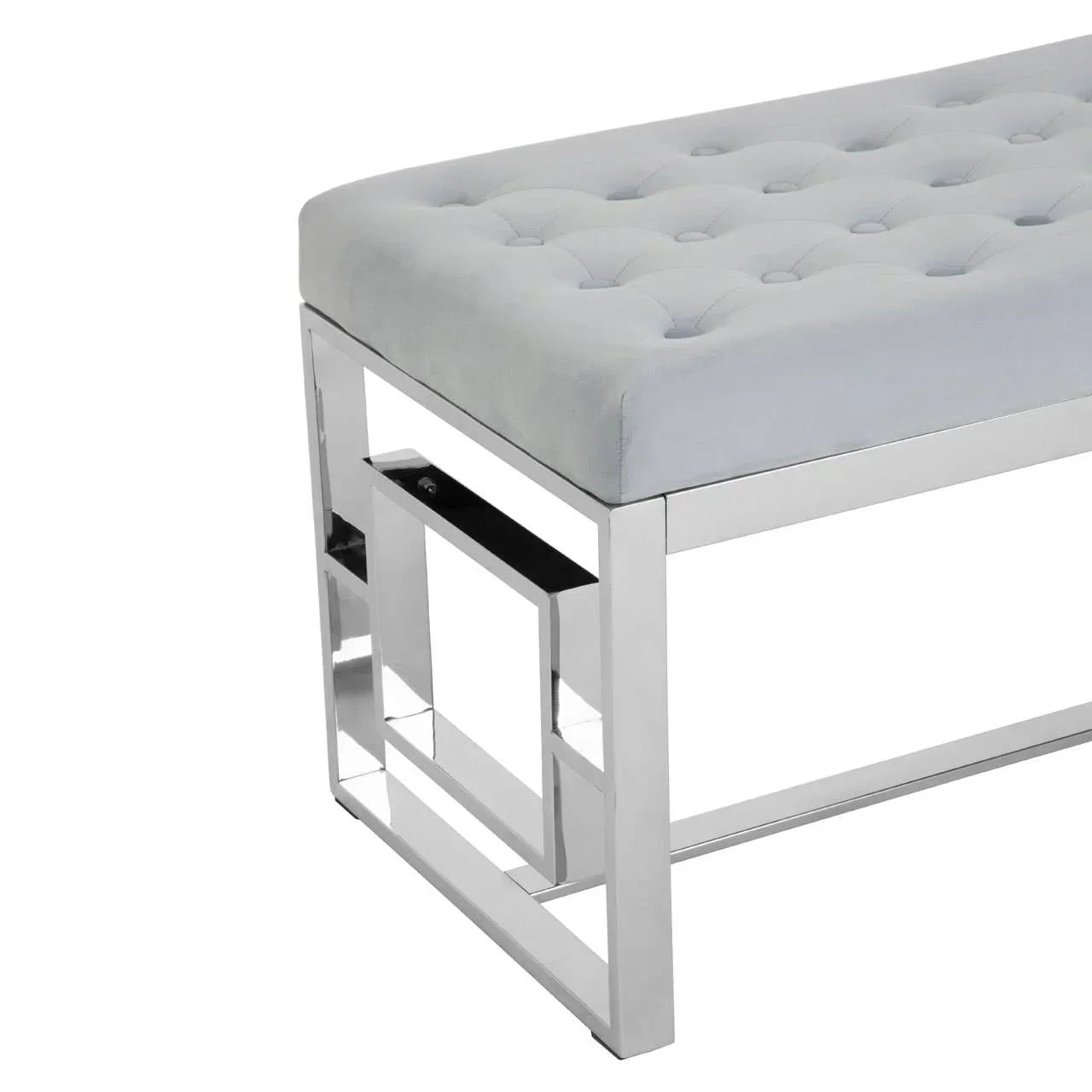 Grey velvet bench with chrome metal frame and geometric leg detailing
