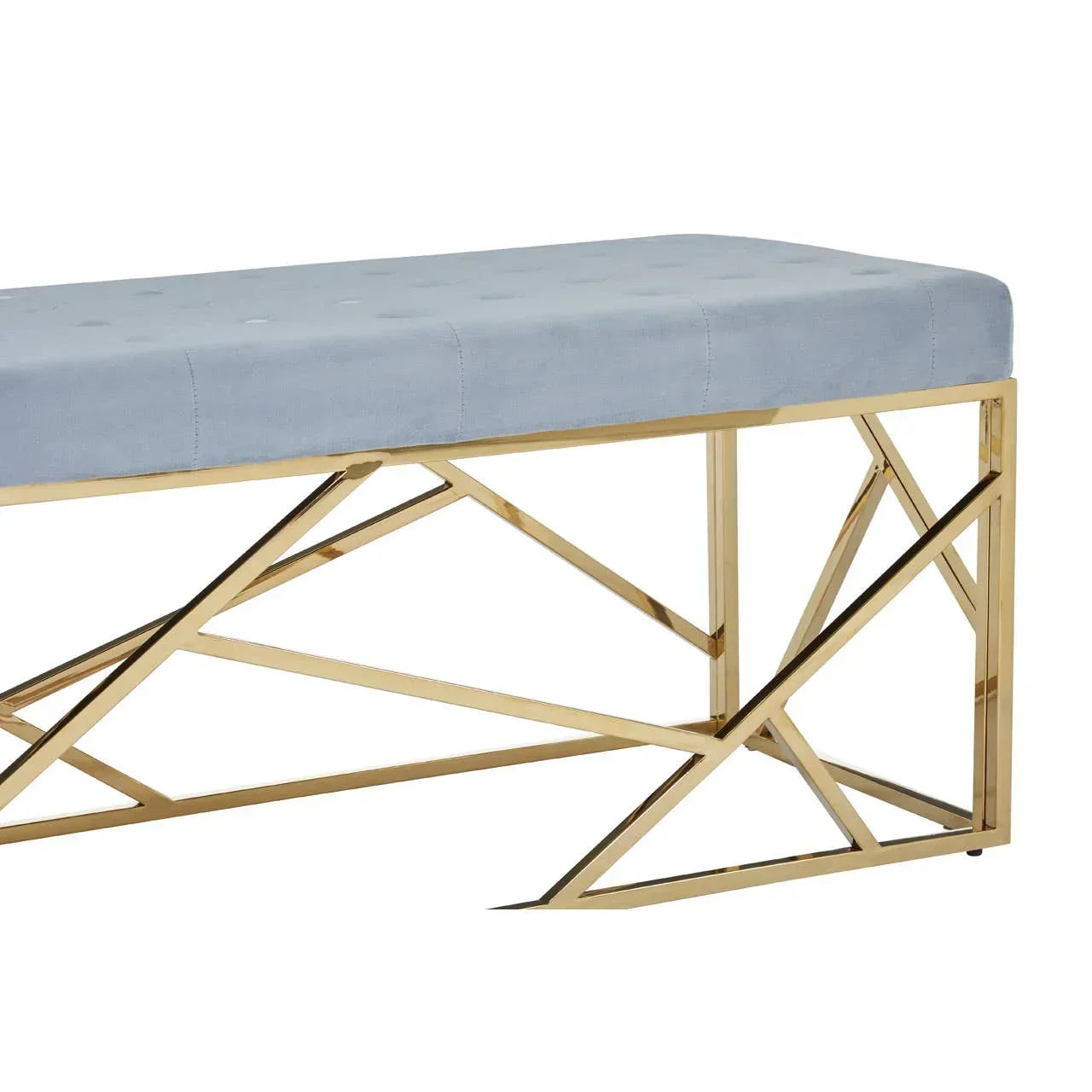 Light blue upholstered bench with gold metal geometric base, shown from side angle