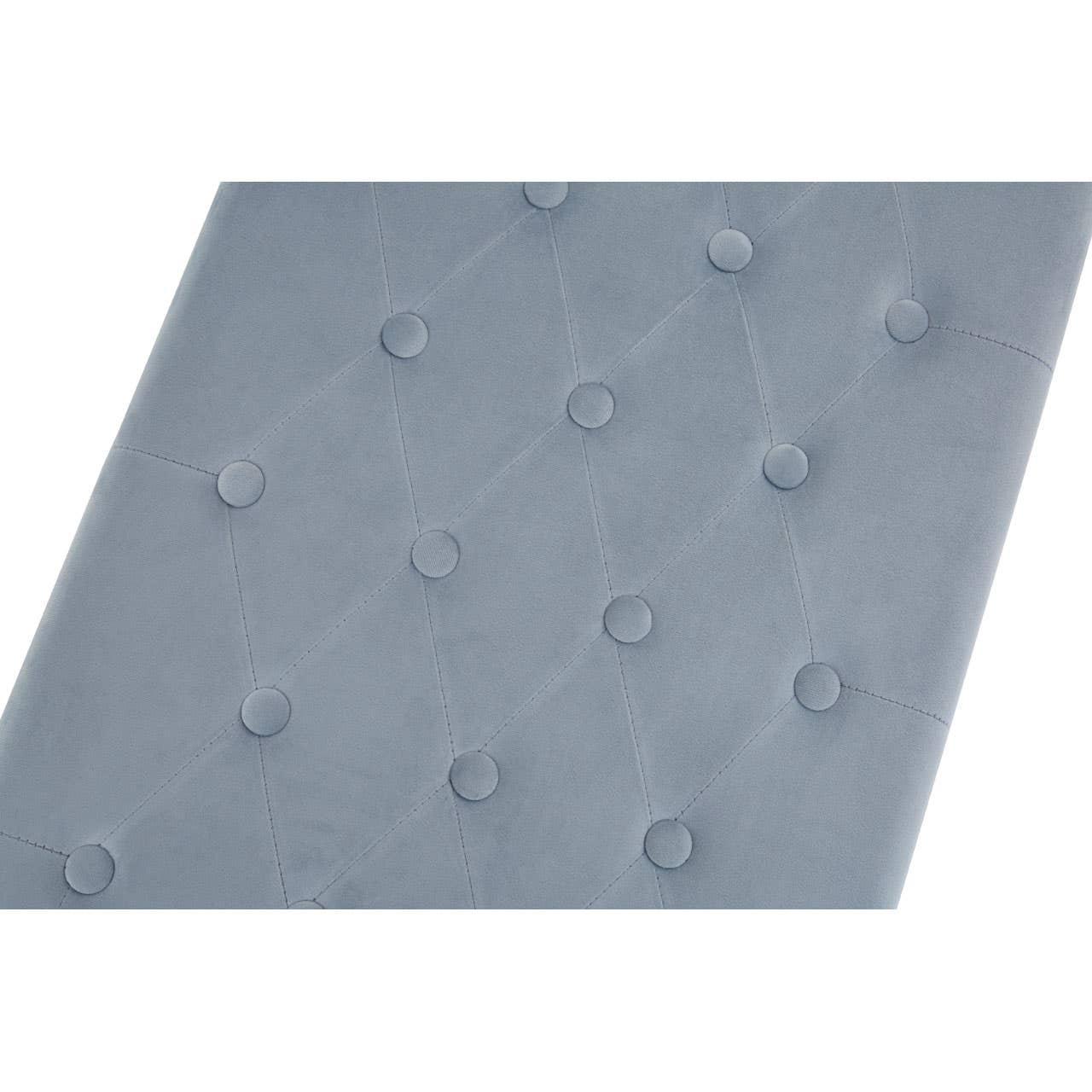 Light grey velvet upholstered headboard with diamond button tufting detail