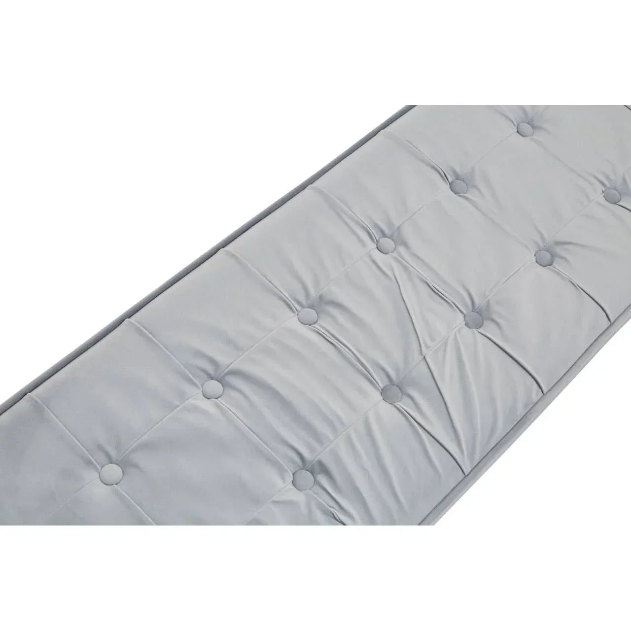 Light grey upholstered bench seat cushion with button tufting detail