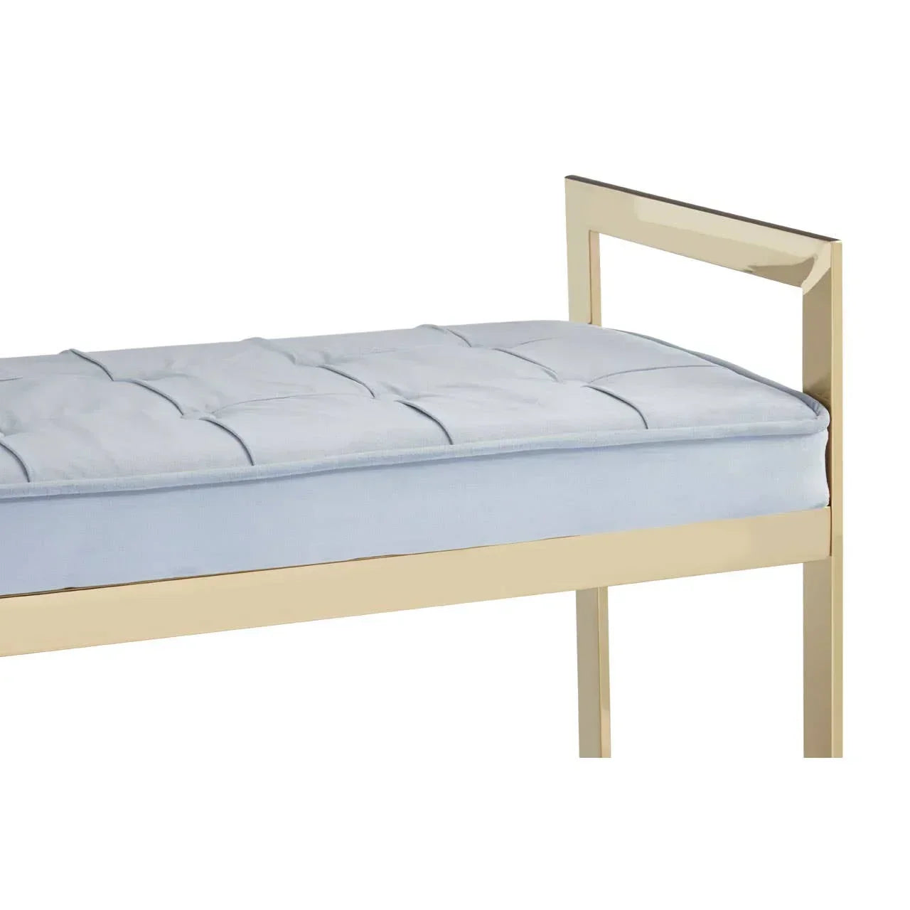 Gold metal bench frame with light blue tufted cushion, side angle view