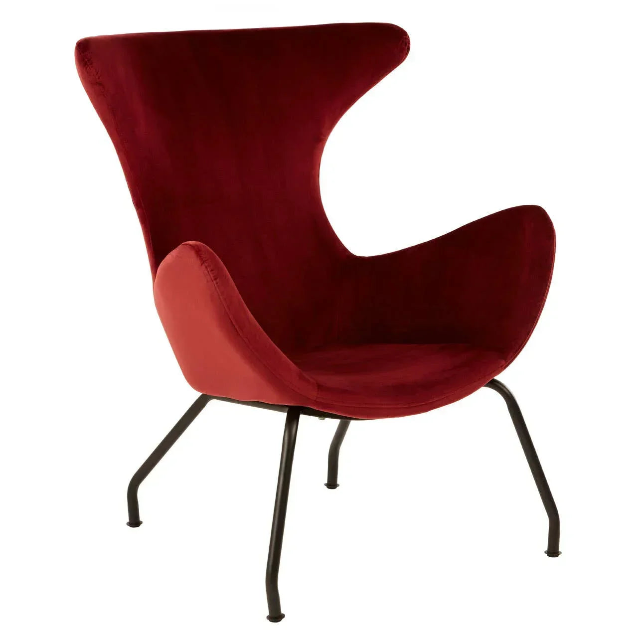 Red velvet accent chair with winged back and black metal legs, angled front view