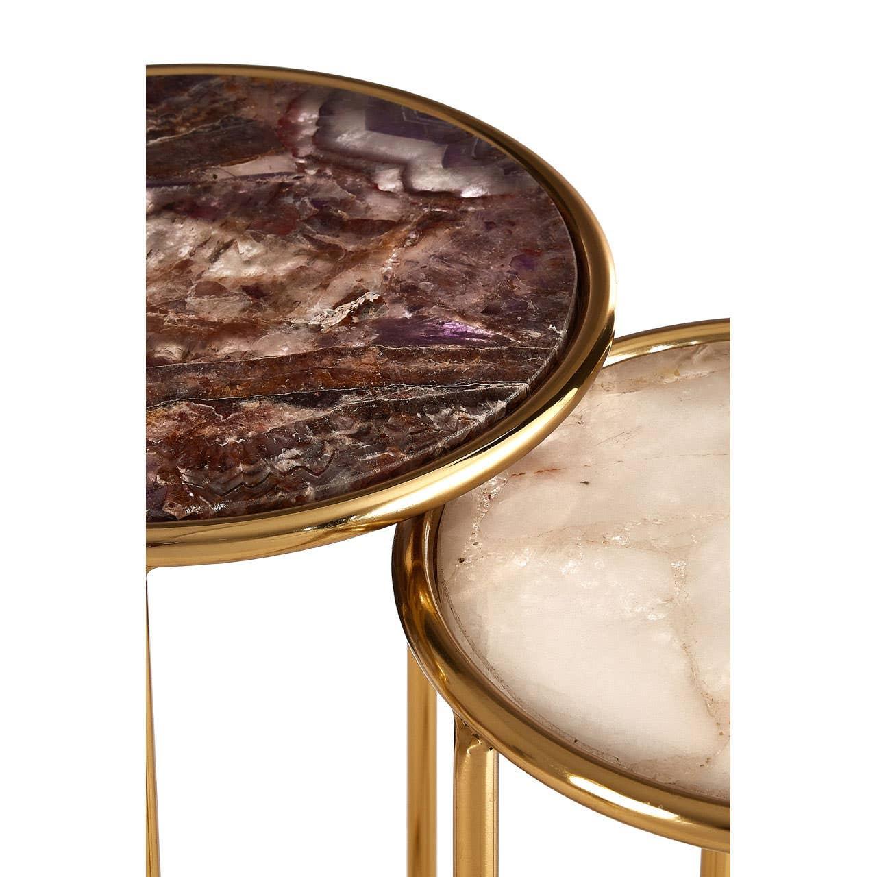 Round nesting tables with gold metal frames and purple and white agate tops