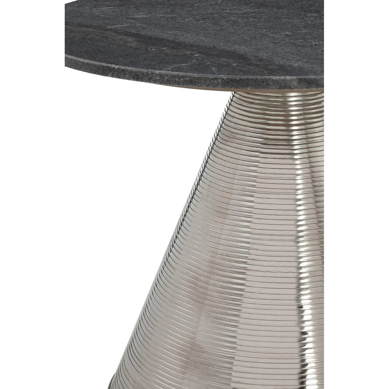 Round black marble dining table with ribbed silver metal base, close-up view