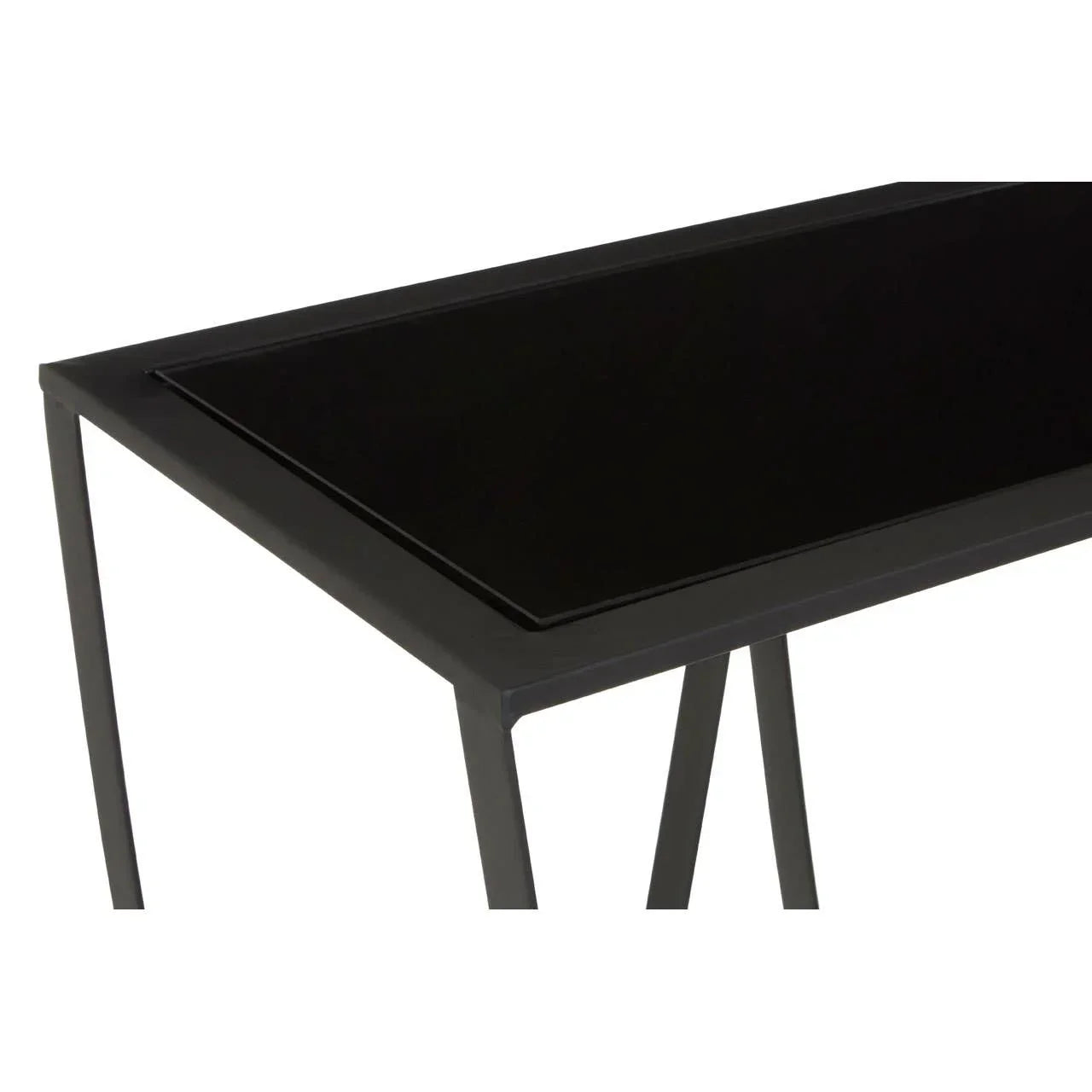 Black glass top console table with slim metal frame, angled corner view