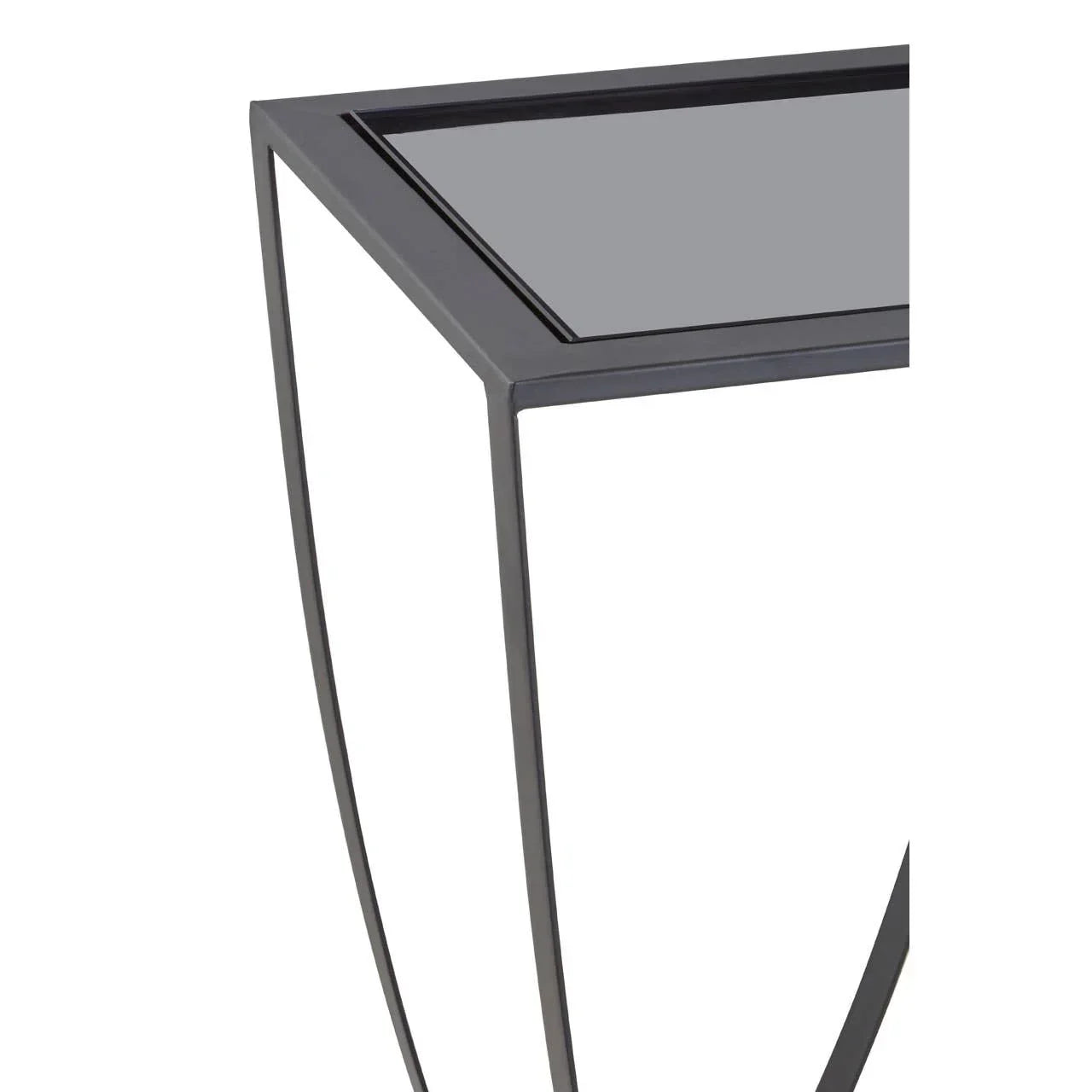 Close-up of black metal side table with glass top and geometric frame