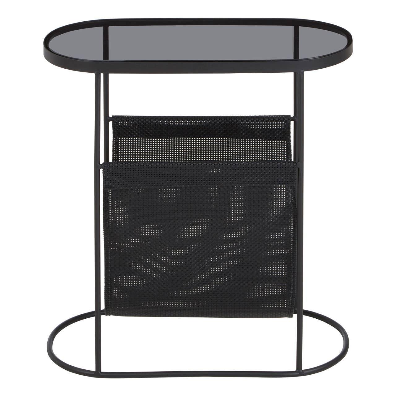 Black metal side table with glass top and mesh magazine holder, front view