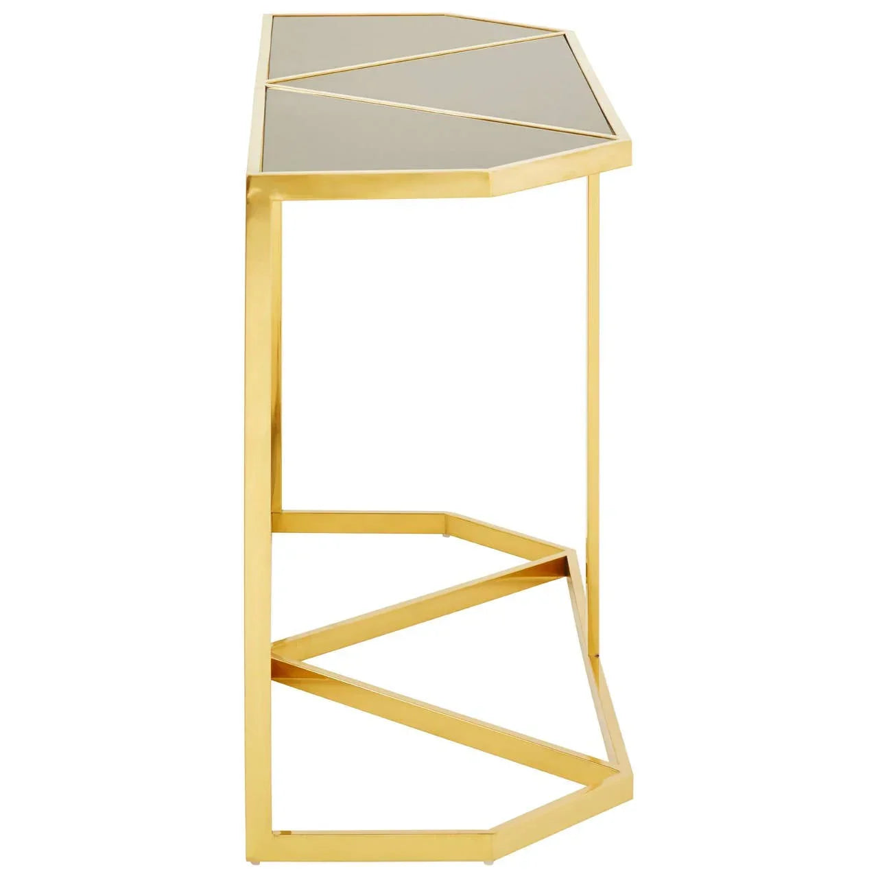 Gold metal console table with geometric glass top shown from side angle