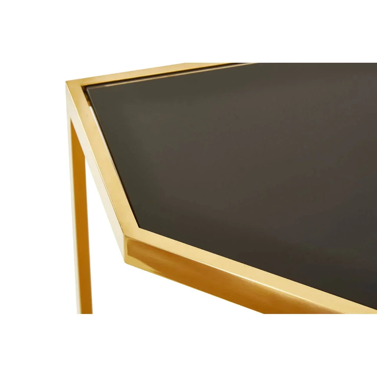 Hexagonal table with black glass top and gold metal frame corner detail