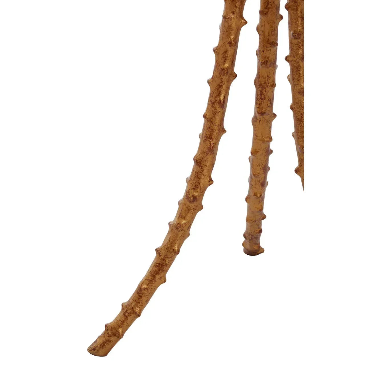 Textured gold metal table legs with branch-like design