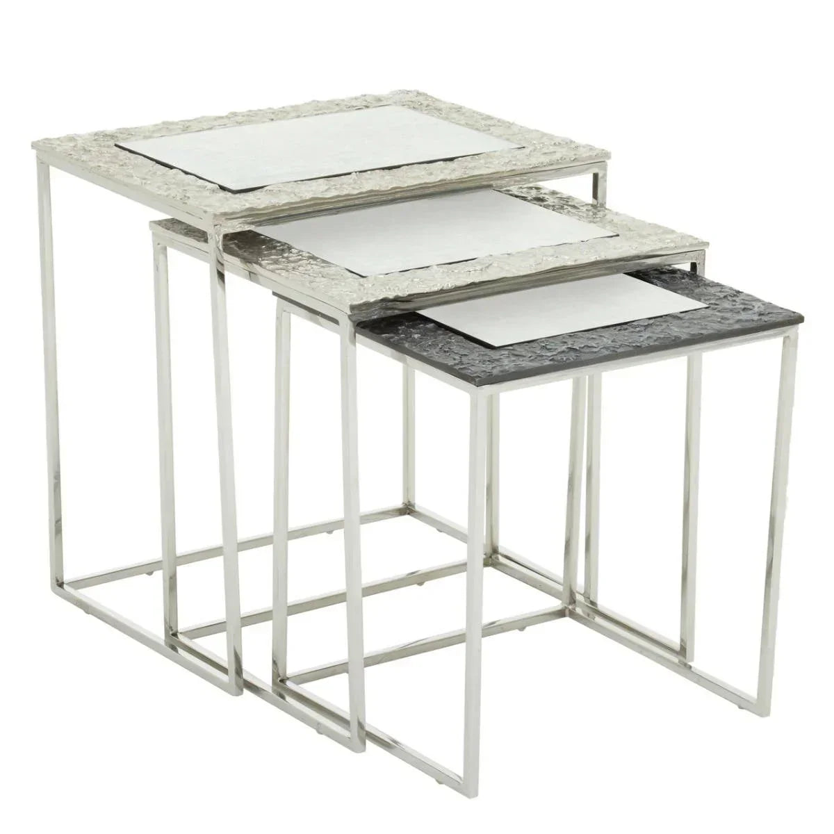 Silver and glass nesting tables set with metal frames and textured rectangular tops