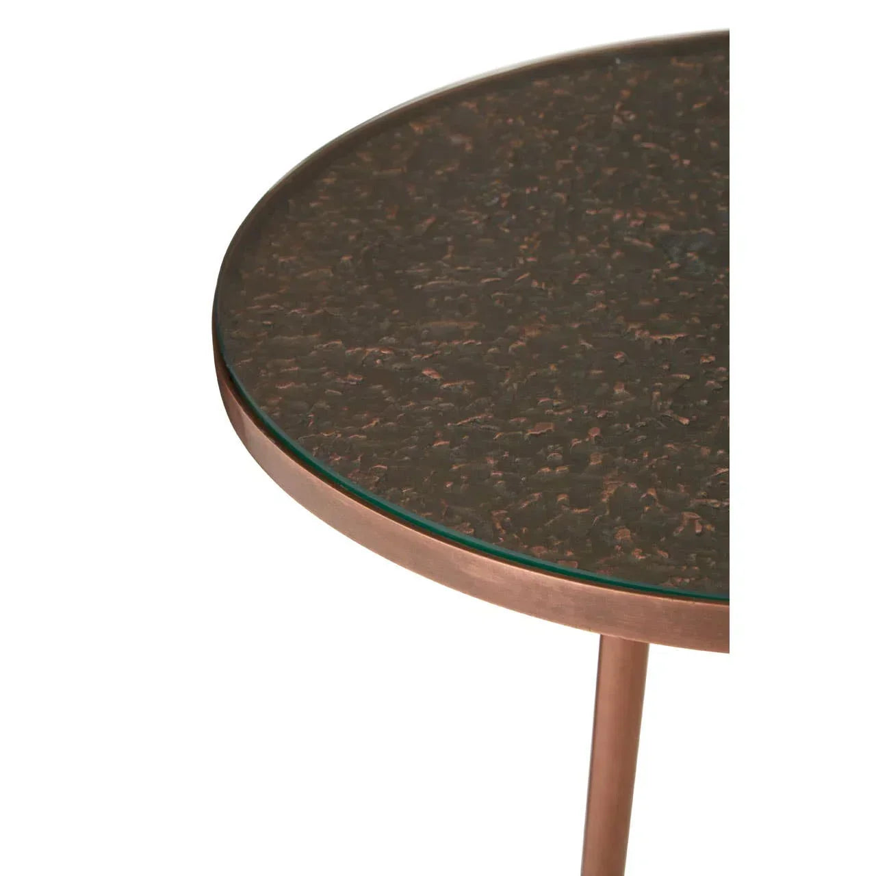 Round metal side table with speckled brown top and slim copper frame, close-up view