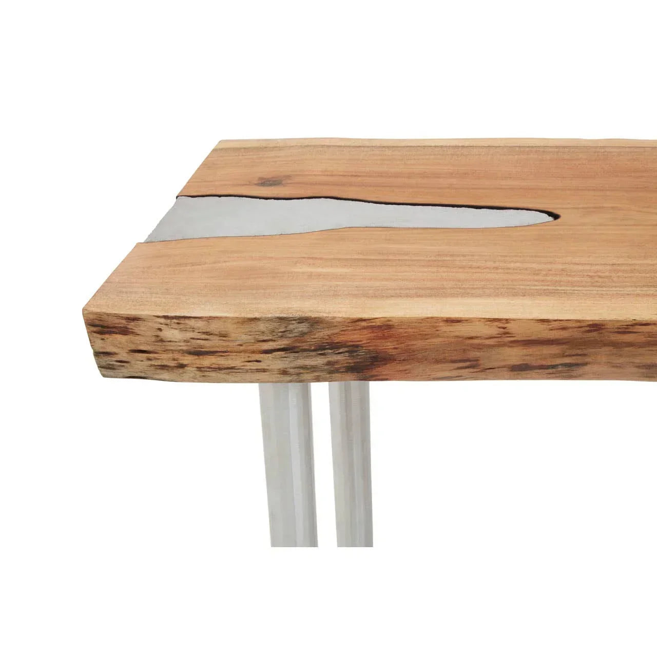 Closeup of wood and glass dining table with straight metal legs